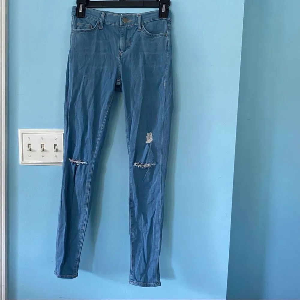 Topshop skinny blue jean with rips